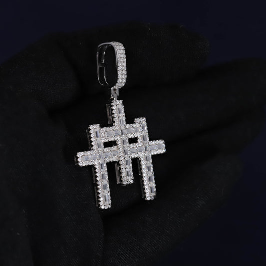 Silver hashtag pendant on a black background
