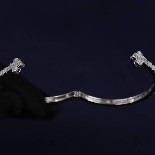 Silver bracelet on a dark background