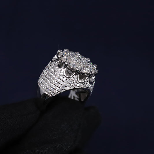 Silver ring with multiple stones on a black background