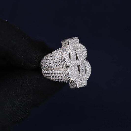 Silver dollar sign ring on a black background