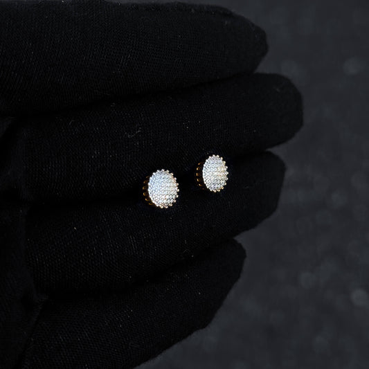 Gold-plated 8mm moissanite cluster stud earrings shown on display, sparkling diamond detail.