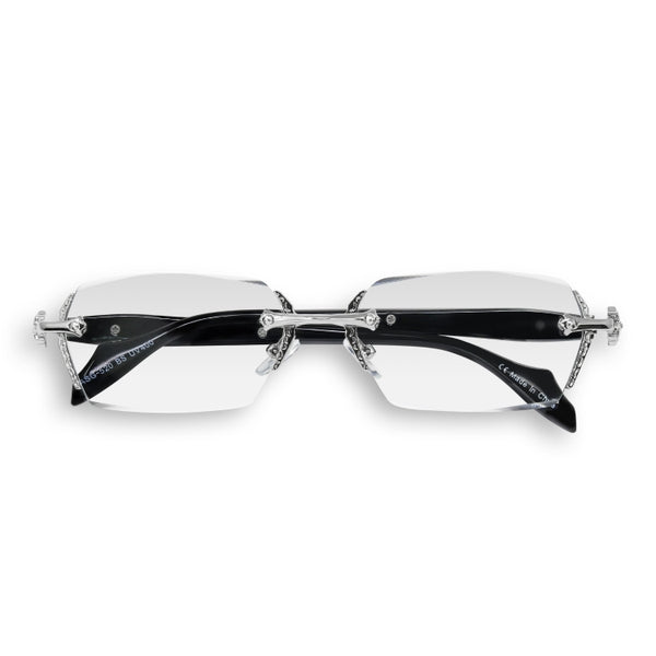 Sunglasses with diamond-studded rim on a white background