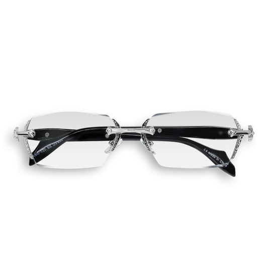 Sunglasses with diamond-studded rim on a white background