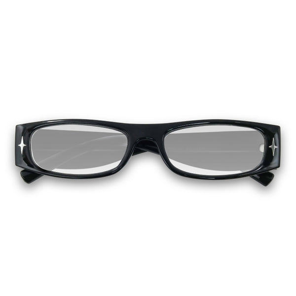 Black eyeglasses with silver accents on a white background