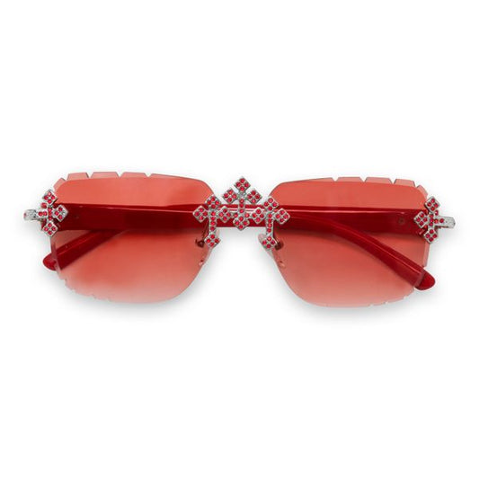 Red sunglasses with decorative elements on a white background