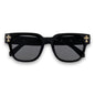 Black sunglasses with gold accents on a white background