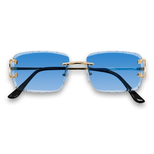 Sunglasses with blue lenses and gold frames on a white background
