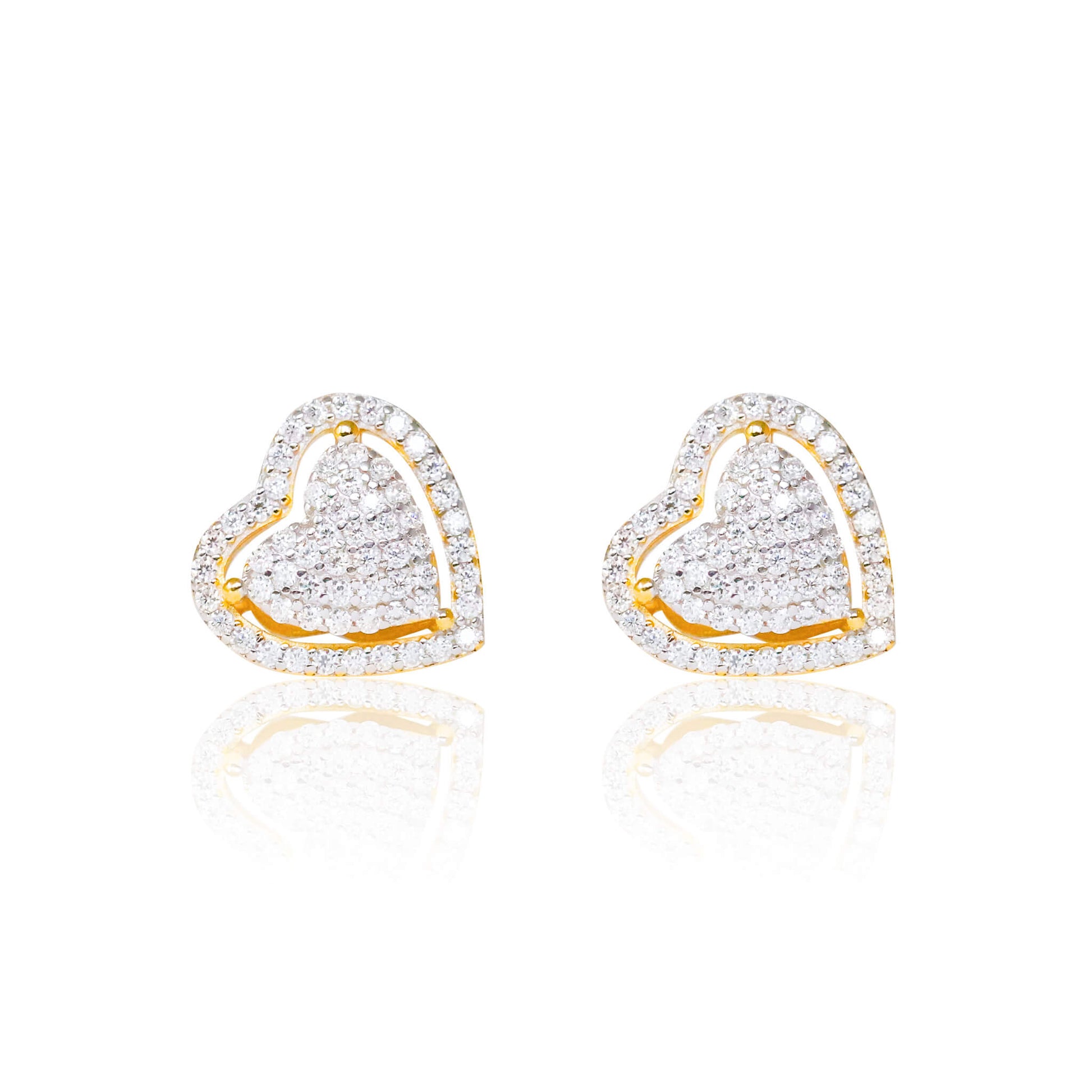 12mm heart moissanite cluster earrings in gold with pavé diamond studs.