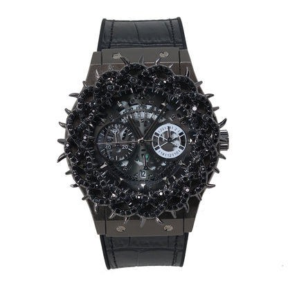 Luxury watch with diamond-studded case and black dial on a white background