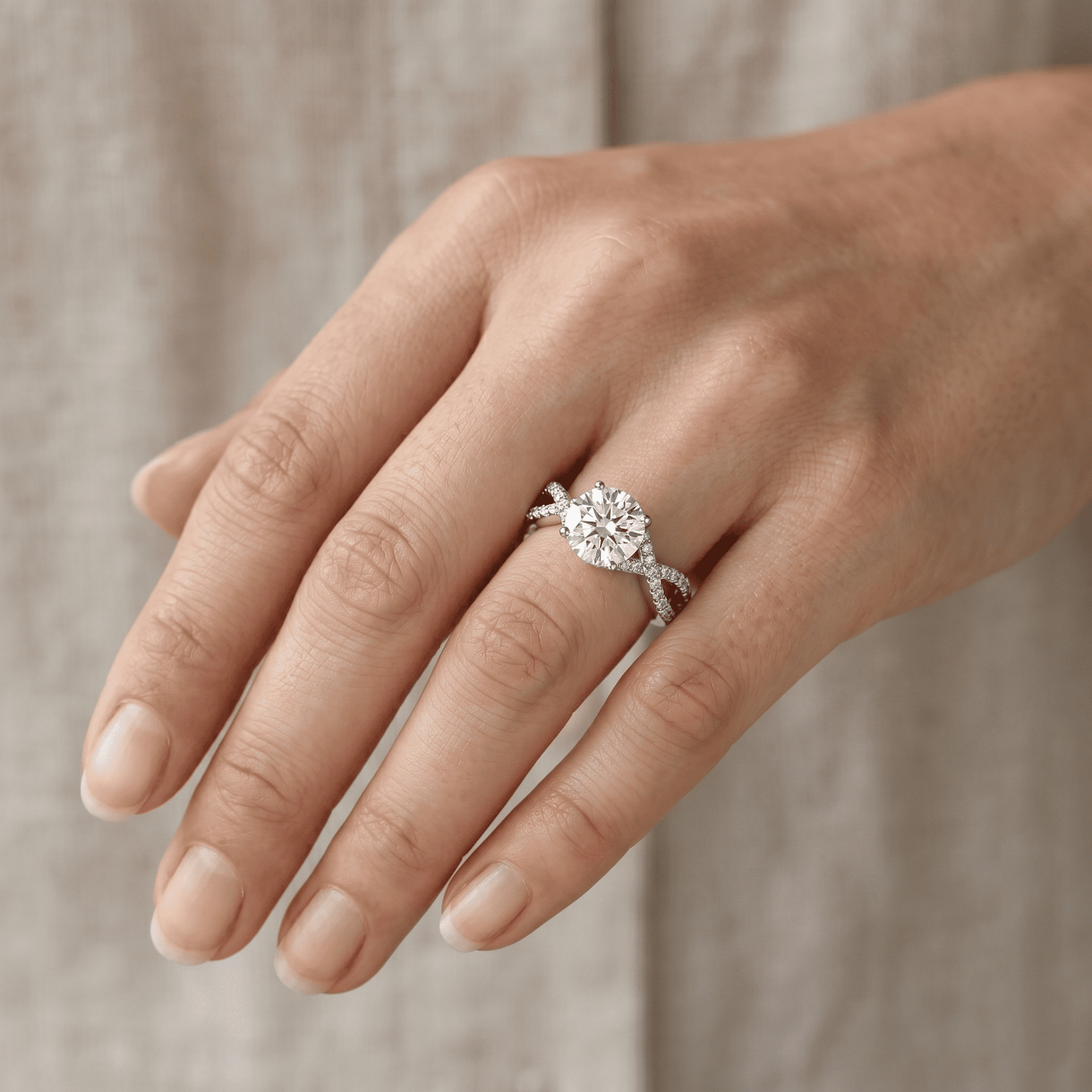 Iced Out 1.38CT Moissanite round solitaire ring with a twisted band in Premium Sterling Silver