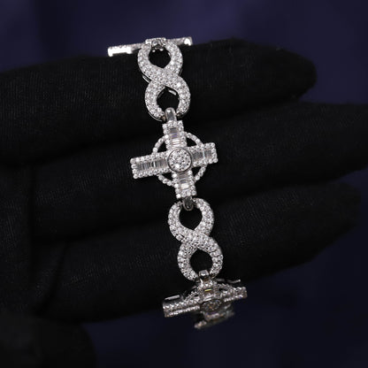 Silver bracelet with intricate design on a dark background