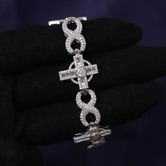 Silver bracelet with intricate design on a dark background
