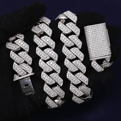 Silver chain bracelet with diamond-like stones on a dark background
