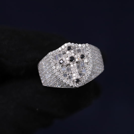 Silver ring with gemstones on a black background