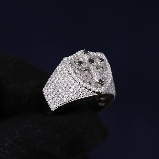 Silver ring with gemstones on a black background