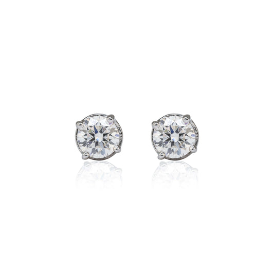 5mm round Moissanite solitaire earrings with 1.1ct diamond studs in sterling silver, front view.