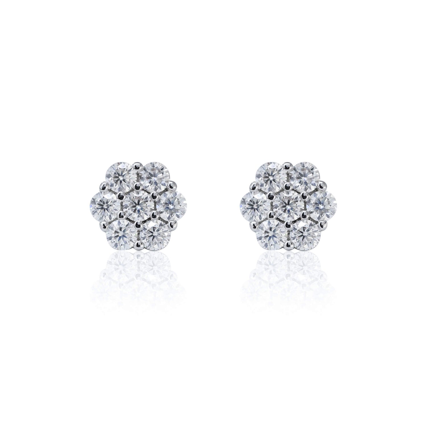 6mm Moissanite cluster earrings with 0.53ct diamond studs in polished sterling silver, front view.