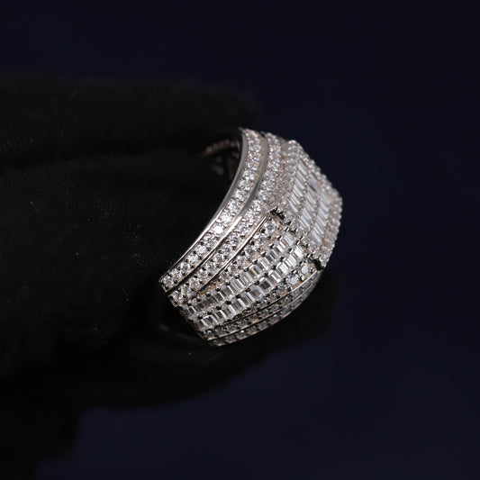 Silver bracelet with clear stones on a black background