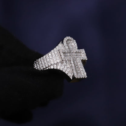 Silver ring with gemstones on a dark background