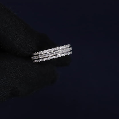 Stack of diamond rings on a black background