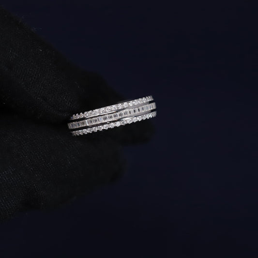 Stack of diamond rings on a black background