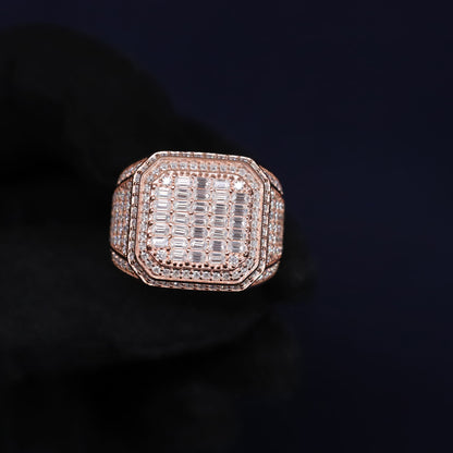 Rose gold ring with diamond accents on a dark background