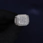 Silver ring with gemstones on a dark background