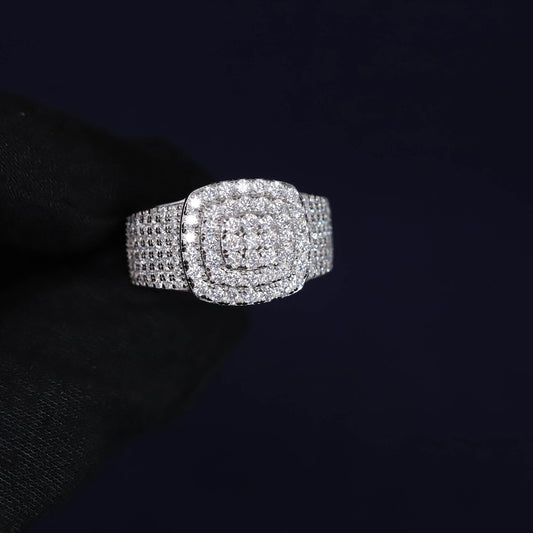 Silver ring with diamond accents on a black background