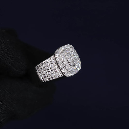Silver ring with diamond accents on a black background