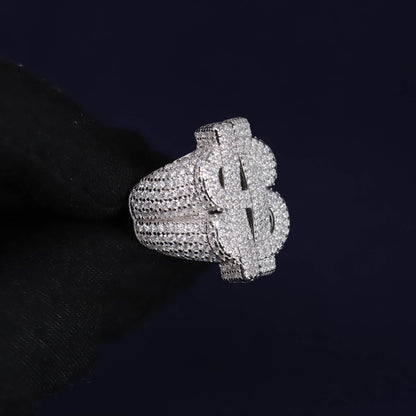 Silver dollar sign ring on a black background