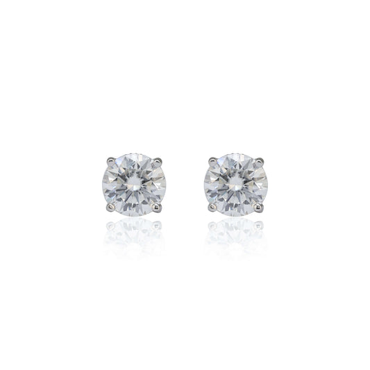 8mm round moissanite solitaire earrings in sterling silver with brilliant 3.2ct stones on white background.