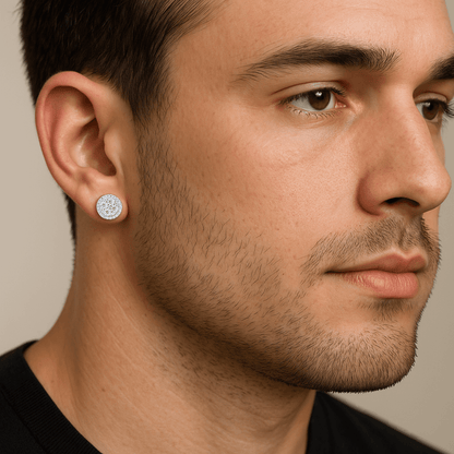 Mens 9mm round moissanite cluster stud earrings in sterling silver shown worn on ear.