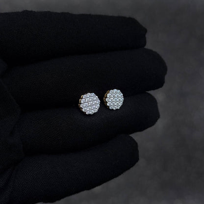 Side-angled view of 9mm Moissanite cluster diamond studs in sterling silver on glove.