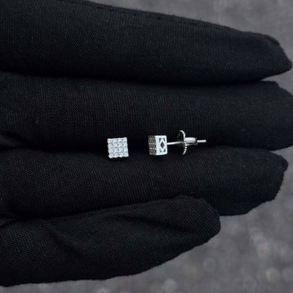 Side and front view of 5mm sterling silver Moissanite square cluster stud earrings on black glove.