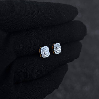 Gold-trim square moissanite cluster earrings shown on black glove, featuring triple halo diamond detail.