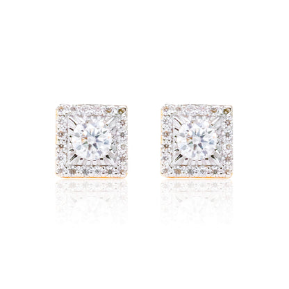 Close-up of sterling silver square moissanite cluster earrings with bright round center stones.