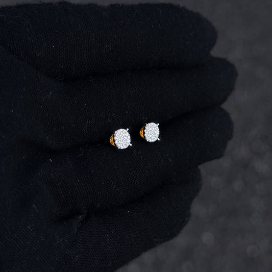 Small 5mm gold-tone Moissanite diamond cluster stud earrings shown on display glove, sterling silver.