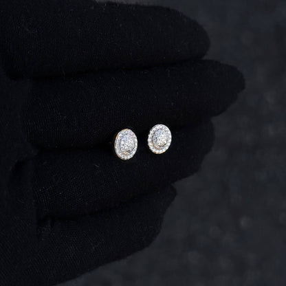 Small 8mm Moissanite cluster diamond studs shown on black glove with gold-tone backing.