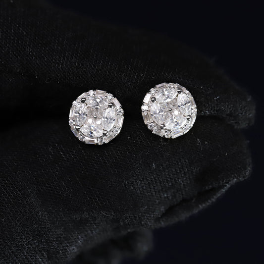 Pair of diamond stud earrings on a black background