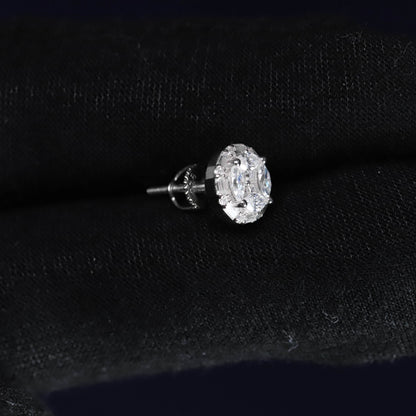 Diamond earring on a black velvet background