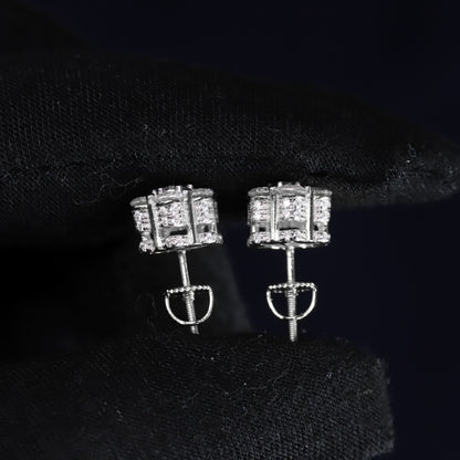 Pair of diamond earrings on a black background