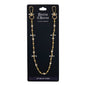 Gold chain wallet strap on a black Denim Chains branded card