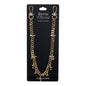 Gold chain with cross pendants on a black Denim Chains branded card.