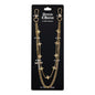Gold chain necklace with star and cross designs on a black card labeled 'Denim Chains'.
