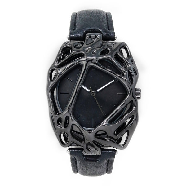 Black geometric watch with a black strap on a white background