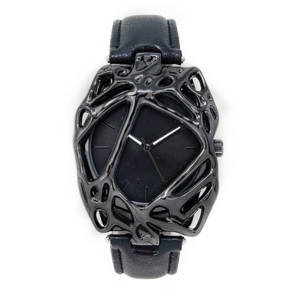 Black geometric watch with a black strap on a white background