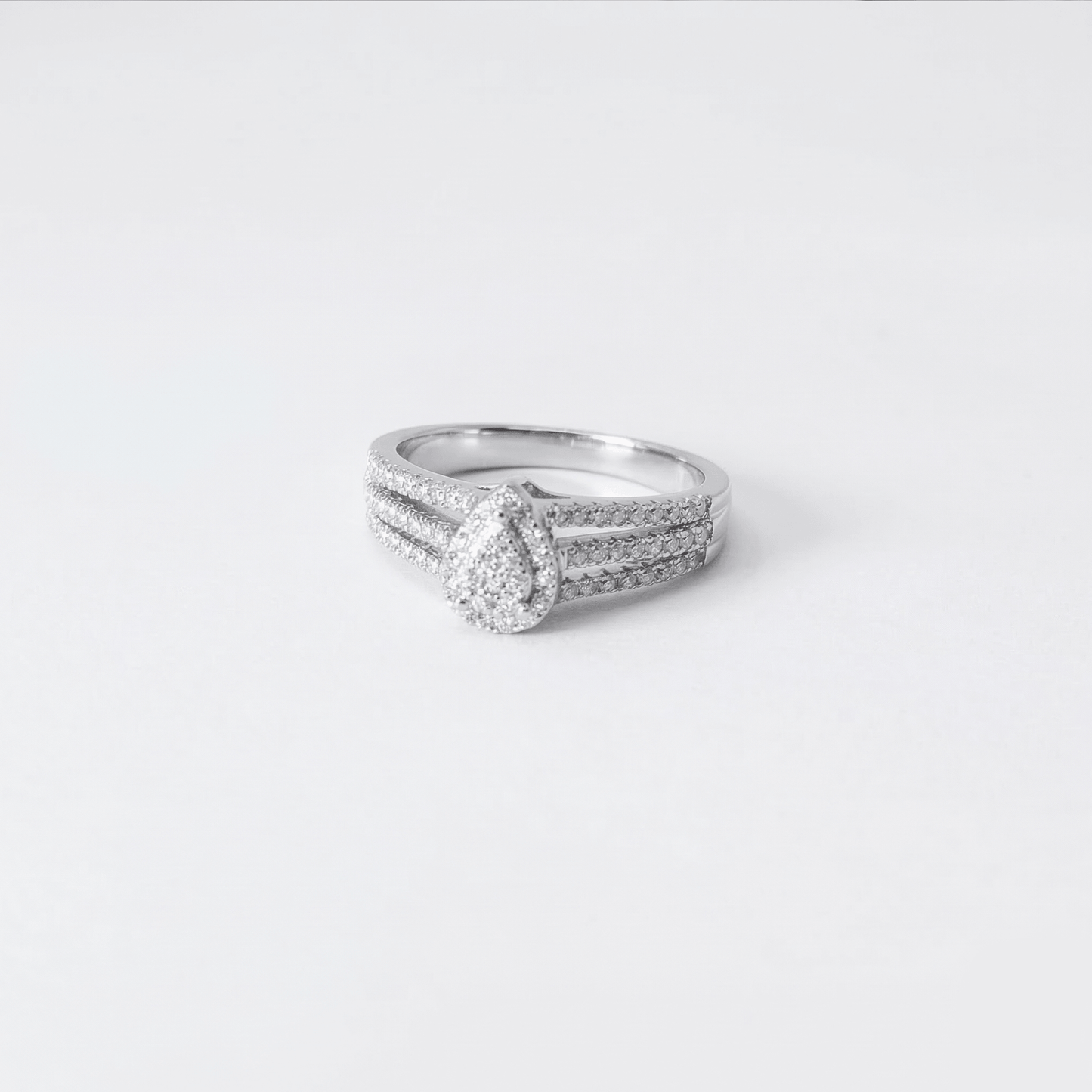 Iced Out 0.33CT Moissanite Pear Ring in Premium Sterling Silver