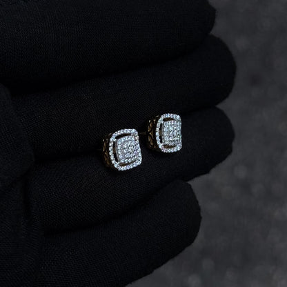 Side-angle view of square 10mm Moissanite cluster diamond stud earrings with gold-accented setting.