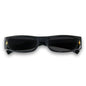 Black sunglasses with gold accents on a white background